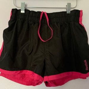 Medium black and pink Reebok athletic shorts